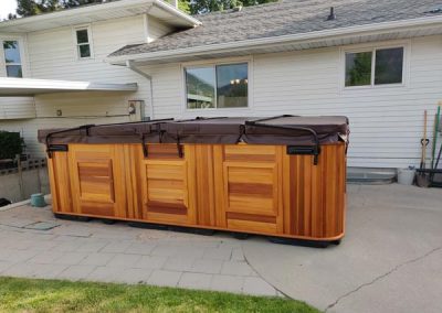 covered all weather pool arctic spas in red cedar cabinet