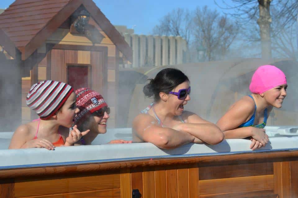 People in a hot tub at the arctic spas quebec carnival